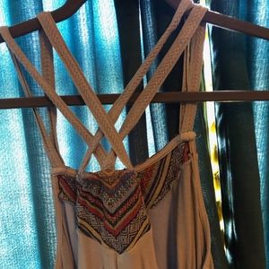 Beautiful cross back tank, with pretty detailing.